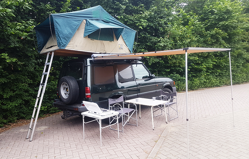 Discovery 300tdi met daktent en luifel te huur